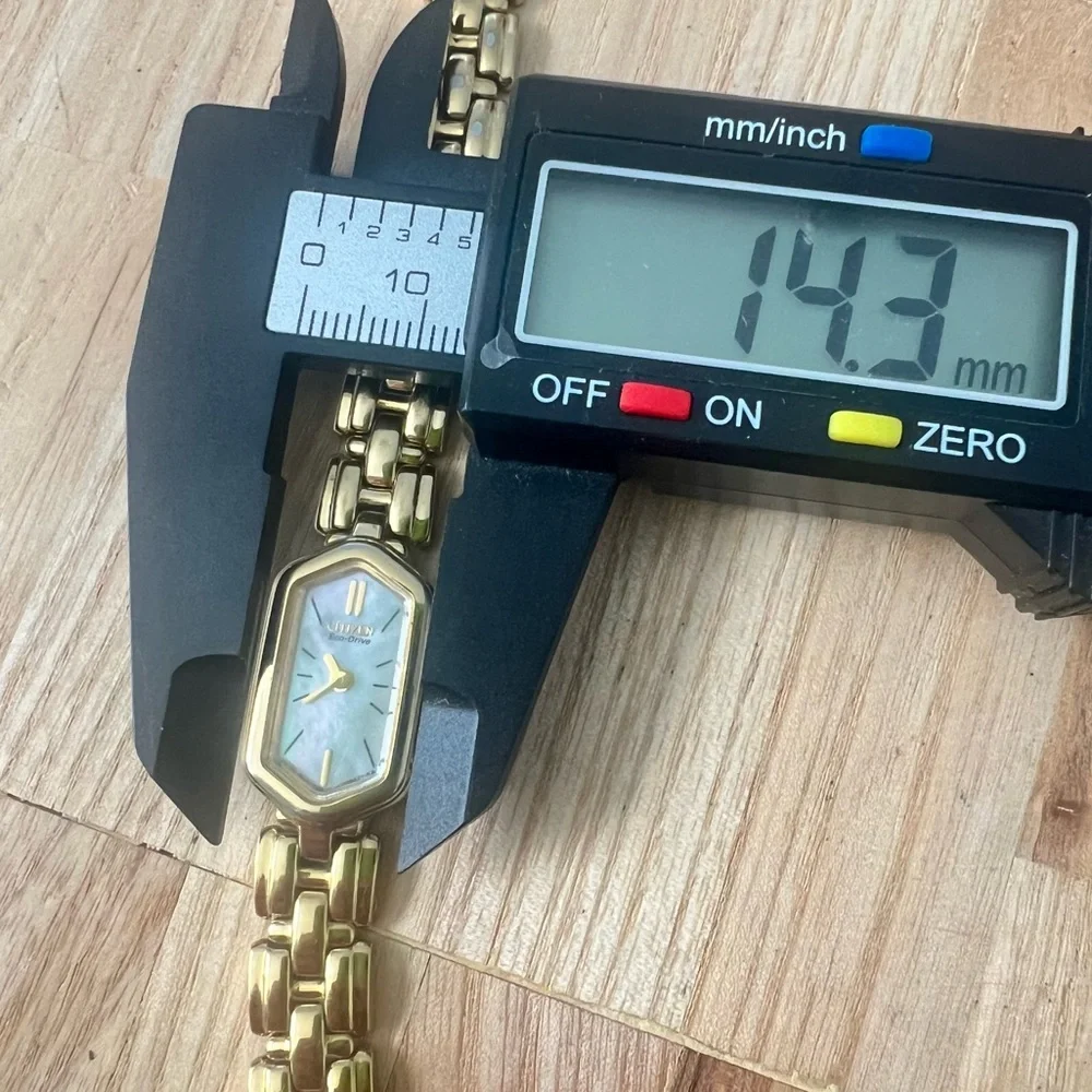 Citizen eco drive ladies gold tone hexagonal bracelet watch